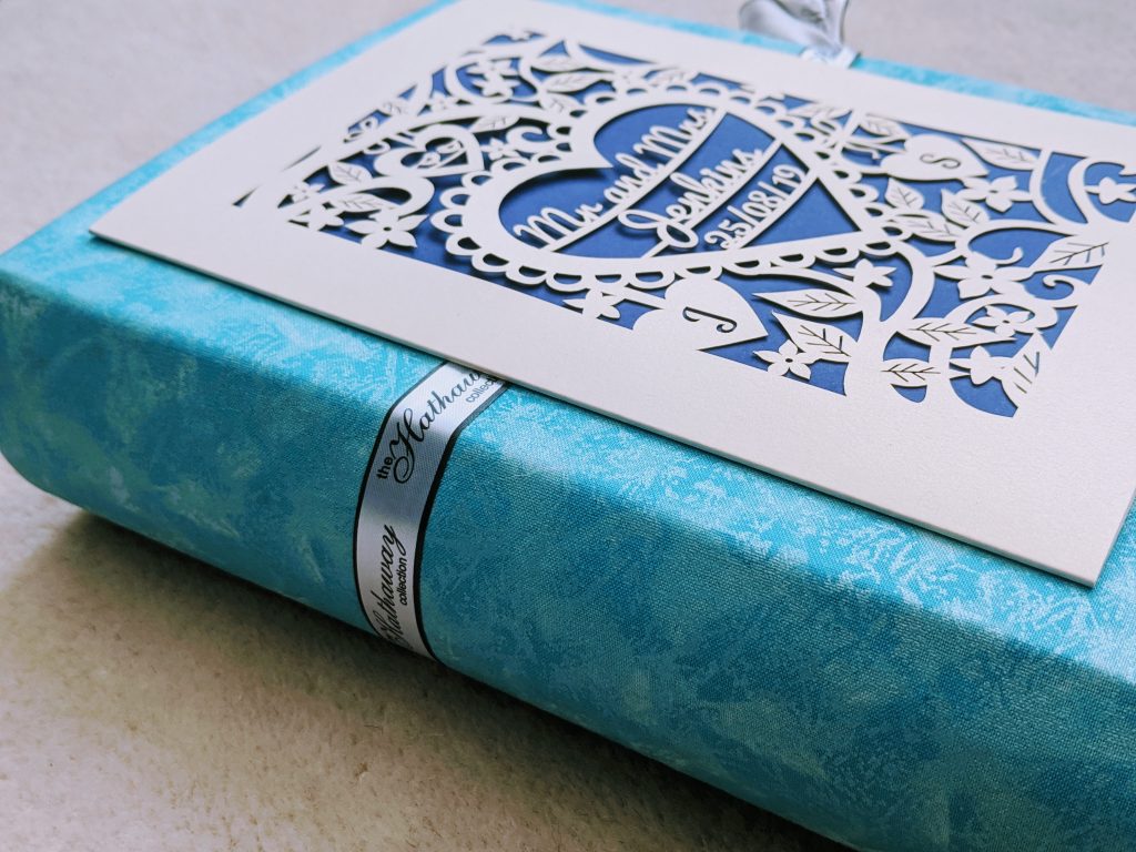 Close up of the spine of our DIY wedding card keepsake book